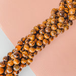 8mm Smooth Tigers Eye Rounds Strand