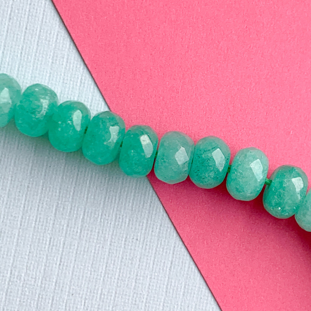 
                
                    Load image into Gallery viewer, 8mm Rivulet Green Faceted Dyed Jade Rondelle Strand
                
            