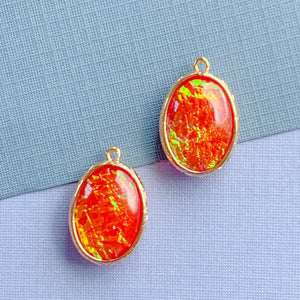 
                
                    Load image into Gallery viewer, 24mm Red Dichroic Glass Oval Pendant - 2 Pack
                
            