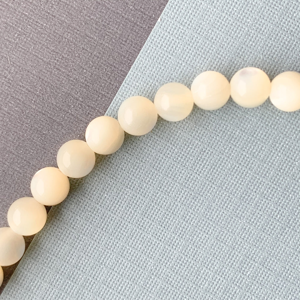 6mm Smooth Mother of Pearl Rounds Strand