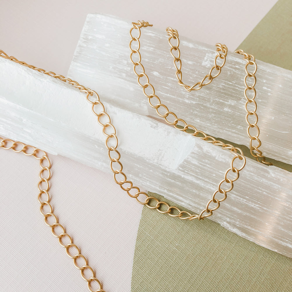 
                
                    Load image into Gallery viewer, 5mm Brushed Gold Curb Chain - Christine White Style
                
            