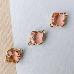 
                
                    Load image into Gallery viewer, 16mm Blush Crystal Gold Quatrefoil Connector
                
            