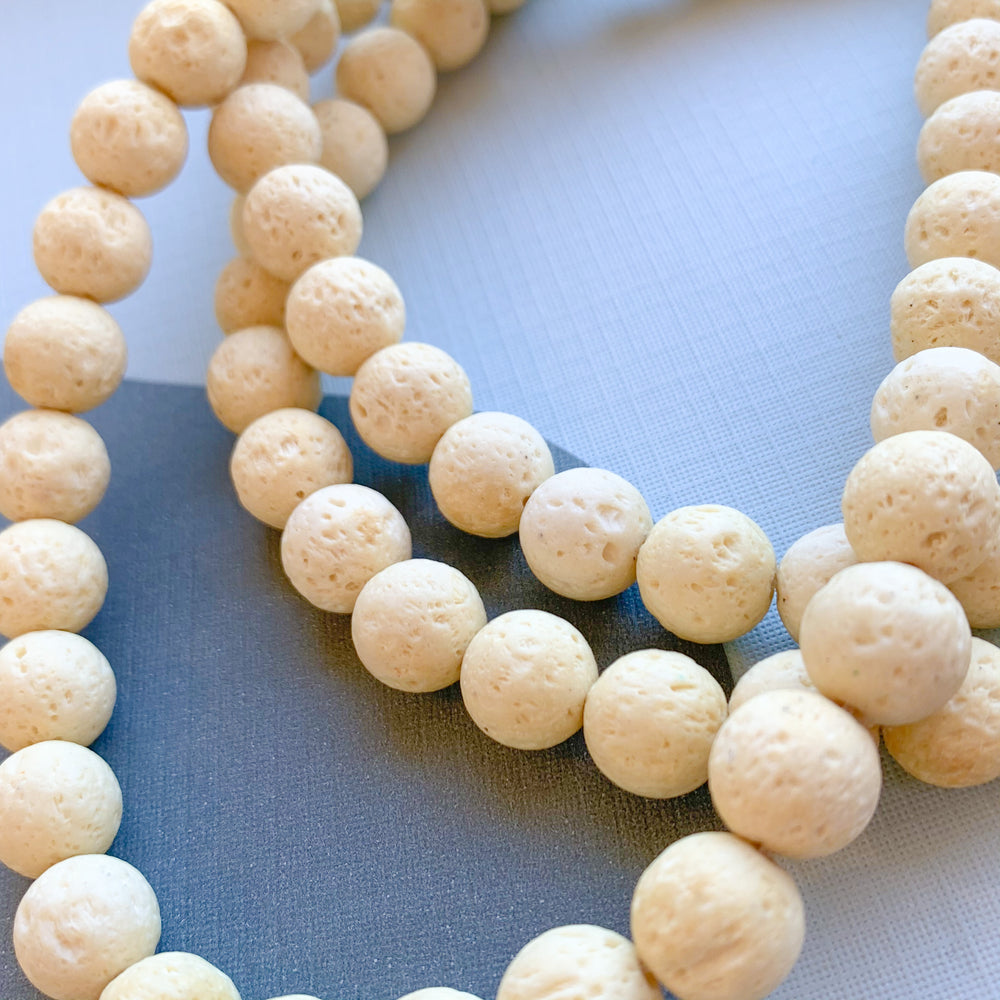 10mm Cream Lava Rounds Strand - Beads, Inc.