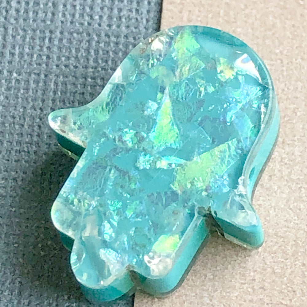 
                
                    Load image into Gallery viewer, 15mm Teal Synthetic Resin Opal Hamsa Hands - 3 Pack
                
            