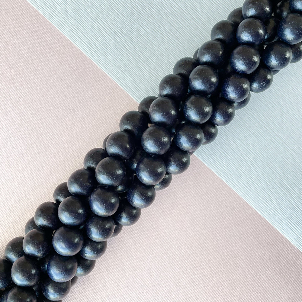 12mm Midnight Wood Rounds Strand - Beads, Inc.