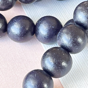 12mm Midnight Wood Rounds Strand - Beads, Inc.