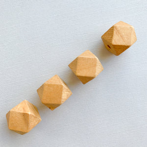
                
                    Load image into Gallery viewer, 20mm Caramel Faceted Wood Beads - 4 Pack
                
            