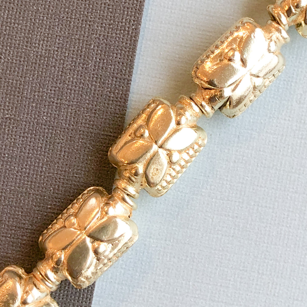 
                
                    Load image into Gallery viewer, 15mm Puffed Gold Floral Motif Rectangular Strand
                
            