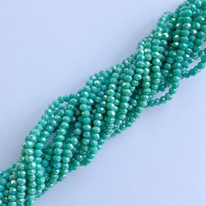 
                
                    Load image into Gallery viewer, 4mm Mystic Spearmint Faceted Crystal Rondelle Strand
                
            