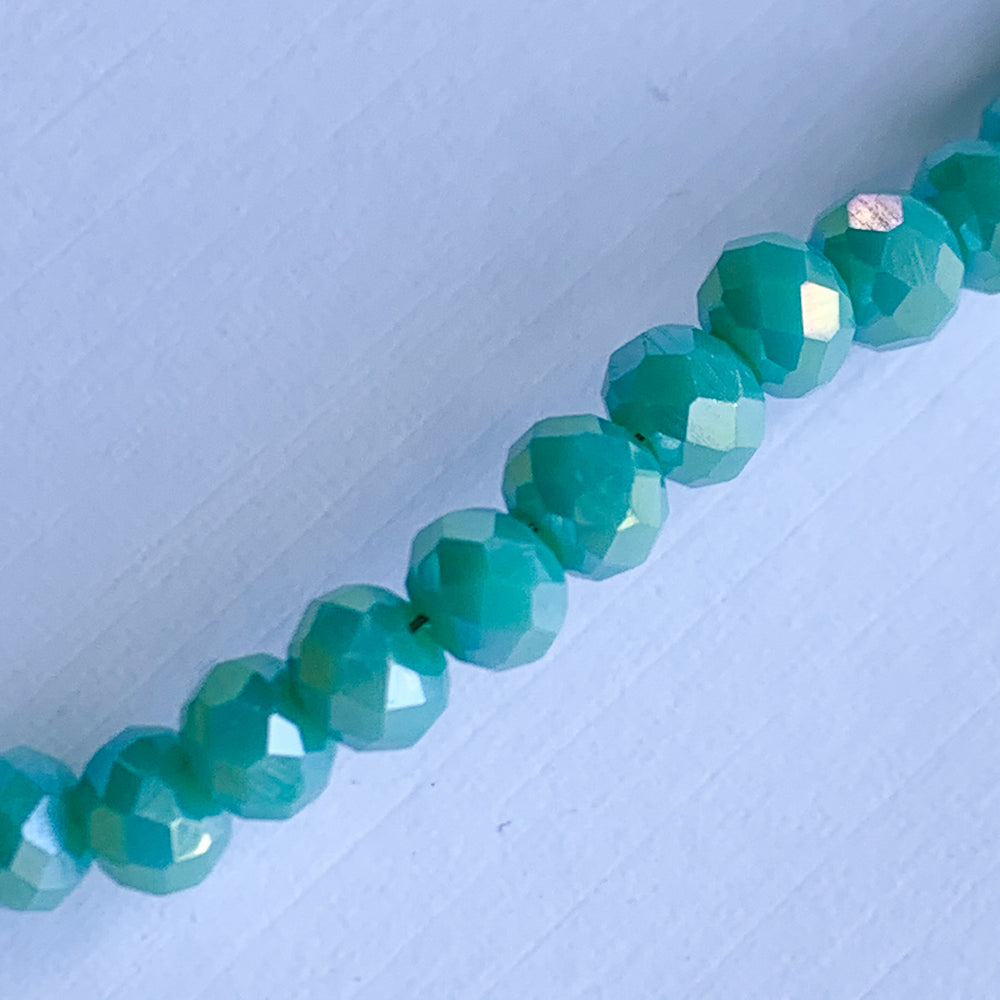 
                
                    Load image into Gallery viewer, 4mm Mystic Spearmint Faceted Crystal Rondelle Strand
                
            
