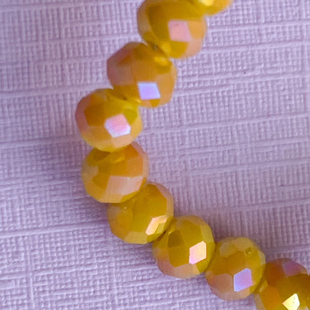 
                
                    Load image into Gallery viewer, 4mm Mystic Mustard Faceted Chinese Crystal Rondelle Strand
                
            