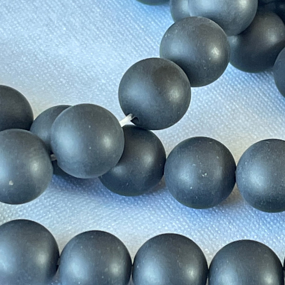 
                
                    Load image into Gallery viewer, 8mm Matte Black Onyx Rounds Strand
                
            