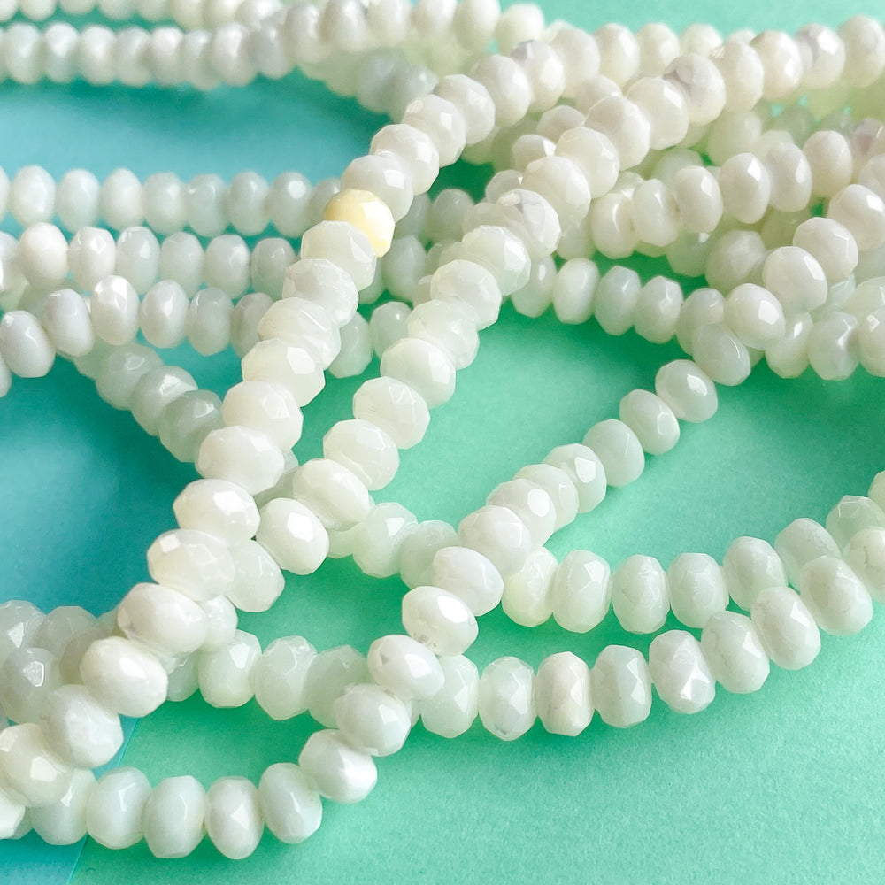 6mm White Mother Of Pearl Faceted Rondelle Strand