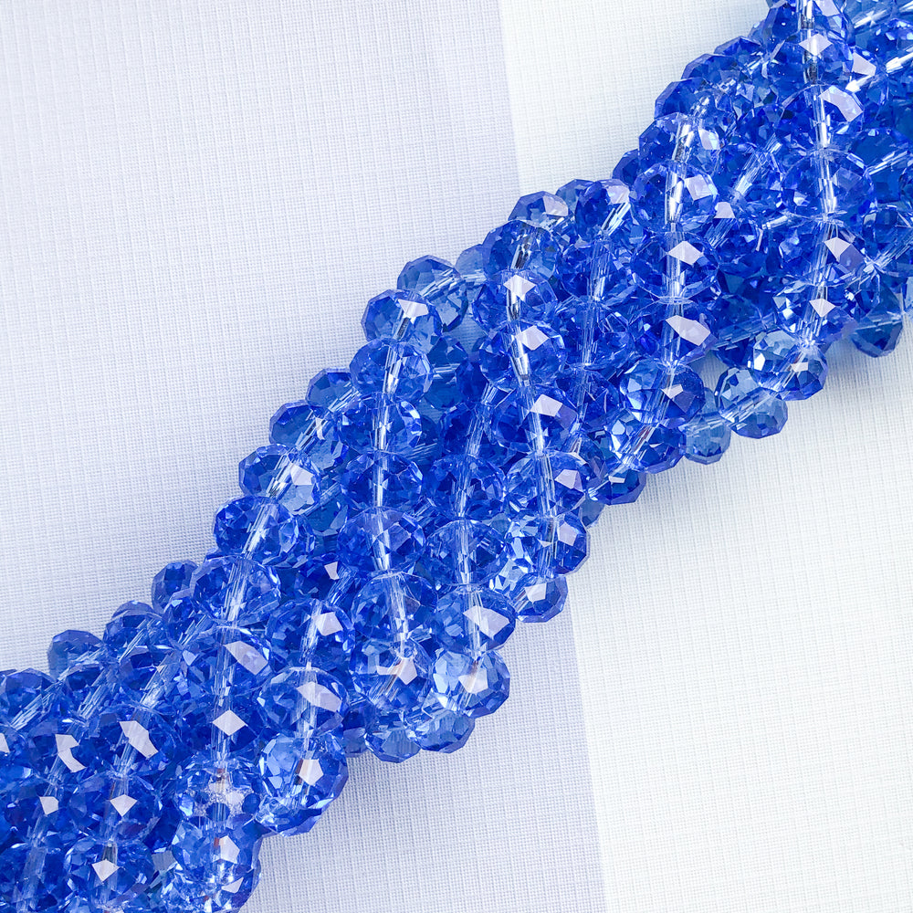 
                
                    Load image into Gallery viewer, 12mm Translucent Blue Faceted Chinese Crystal Rondelle Strand
                
            