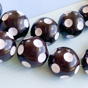 
                
                    Load image into Gallery viewer, 17mm Black + White Polka Dot Plastic Rounds Strand
                
            