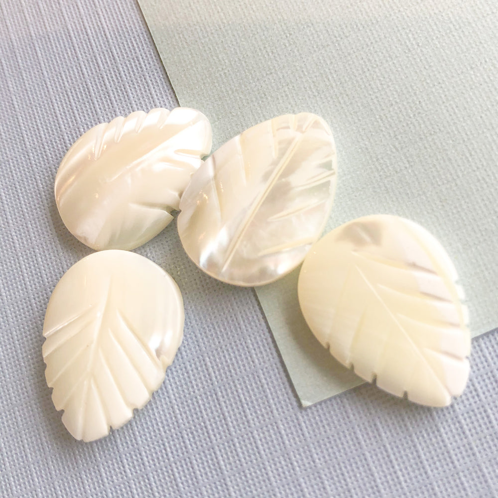 
                
                    Load image into Gallery viewer, 20mm Hand Carved Mother of Pearl Leaf Bead - 4 Pack
                
            