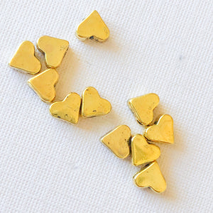 
                
                    Load image into Gallery viewer, 5mm Center-Drilled Gold Pewter Heart Bead - 20 Pack
                
            