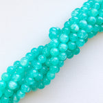 8mm Translucent Teal Dyed Jade Rounds Strand