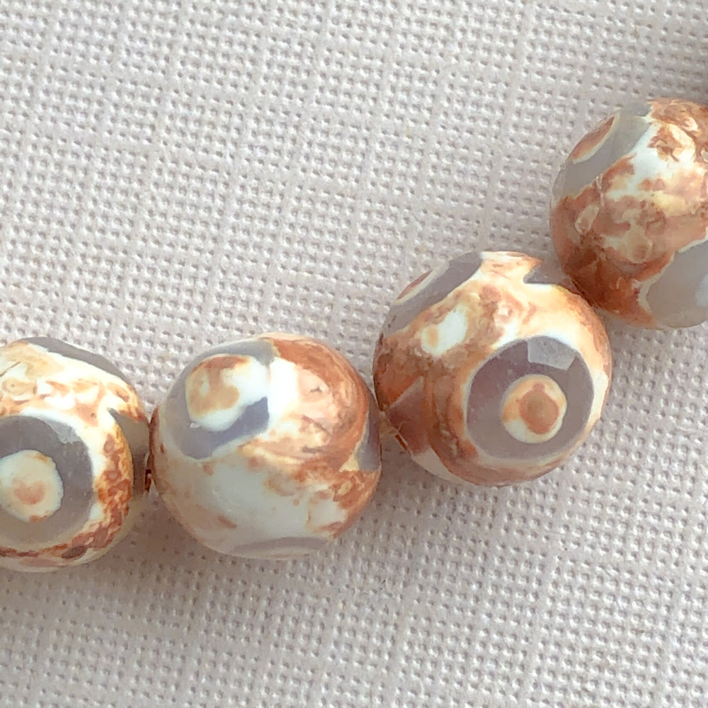 
                
                    Load image into Gallery viewer, 8mm Faceted Bullseye Agate Rounds Strand - Beads, Inc.
                
            