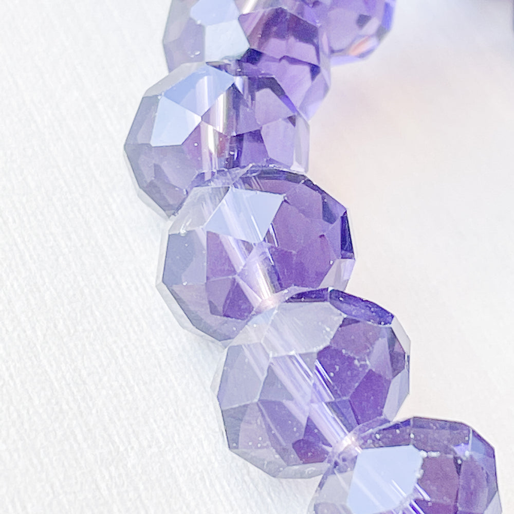 
                
                    Load image into Gallery viewer, 12mm Translucent Violet Faceted Chinese Crystal Rondelle Strand
                
            