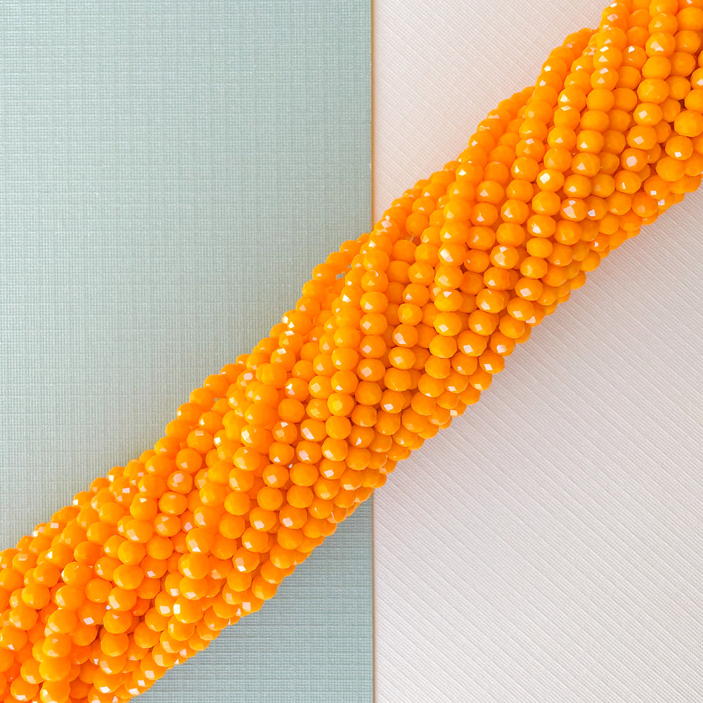 
                
                    Load image into Gallery viewer, 4mm Creamsicle Faceted Chinese Crystal Strand
                
            