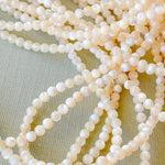 2mm Smooth Mother of Pearl Rounds Strand