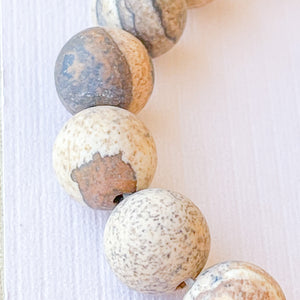 
                
                    Load image into Gallery viewer, 8mm Matte Picture Jasper Rounds Strand
                
            