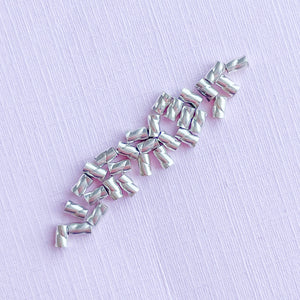
                
                    Load image into Gallery viewer, 3mm Sterling Silver Tornado Crimp Bead - 30 Pack
                
            