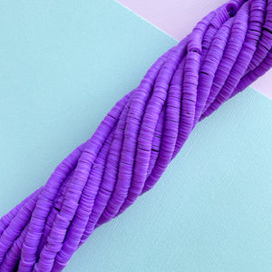 
                
                    Load image into Gallery viewer, 6mm True Purple Polymer Clay Heishi Strand
                
            