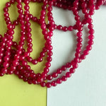 6mm Pomegranate Dyed Jade Faceted Round Strand