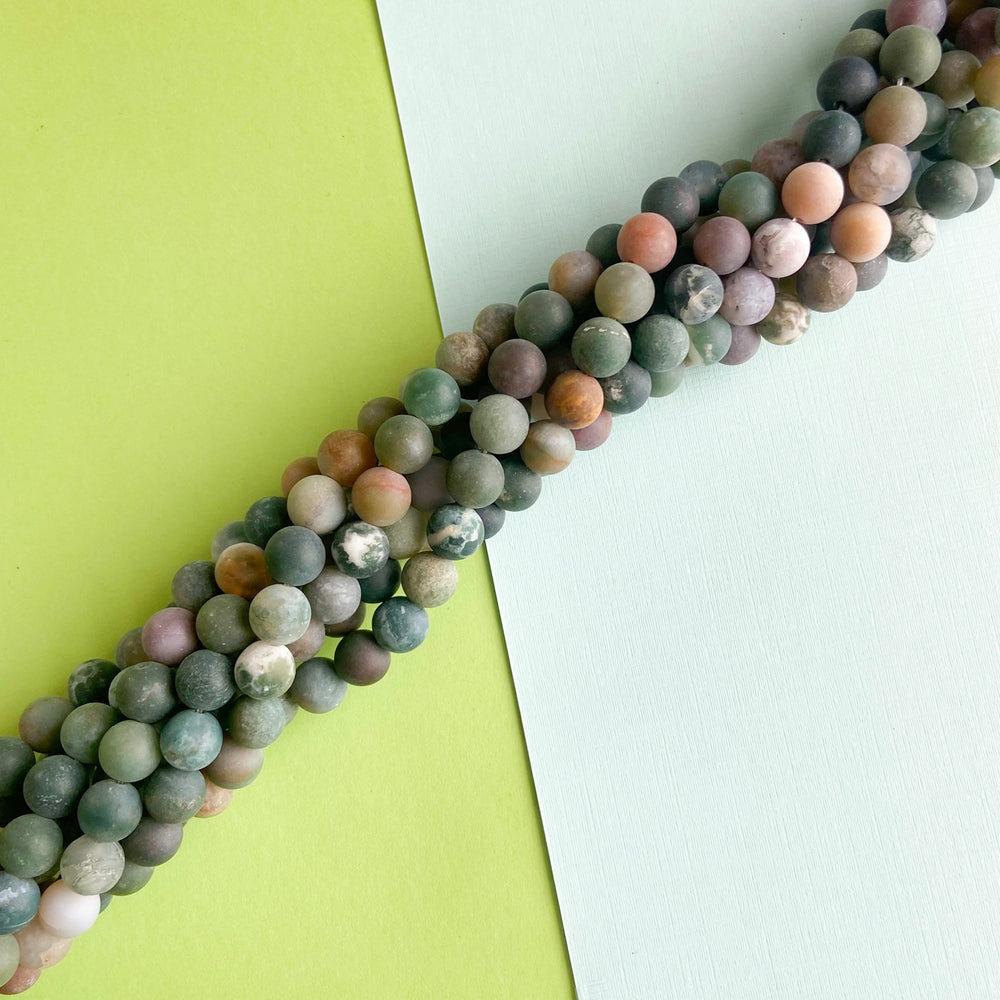 
                
                    Load image into Gallery viewer, 8mm Matte Ocean Jasper Rounds Strand
                
            