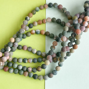 
                
                    Load image into Gallery viewer, 8mm Matte Ocean Jasper Rounds Strand
                
            