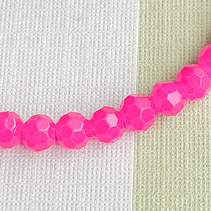 
                
                    Load image into Gallery viewer, 4mm Hot Pink Faceted Chinese Crystal Rounds Strand
                
            