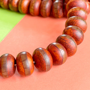
                
                    Load image into Gallery viewer, 12mm Striped DZI Crackle Chestnut Smooth Agate Rondelle Strand
                
            