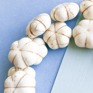 
                
                    Load image into Gallery viewer, 20mm White Carved Magnesite Flower Bead Strand
                
            
