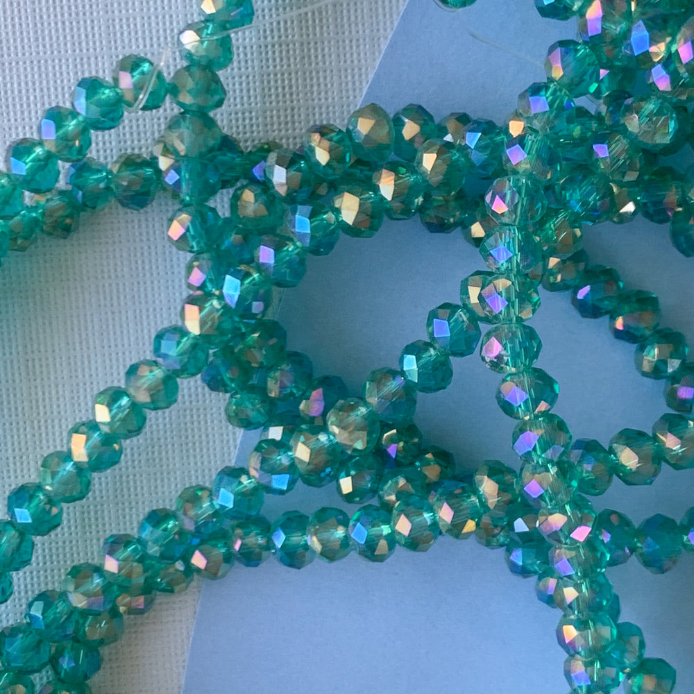 
                
                    Load image into Gallery viewer, 4mm Iridescent Viridian Faceted Chinese Crystal Rondelle Strand
                
            