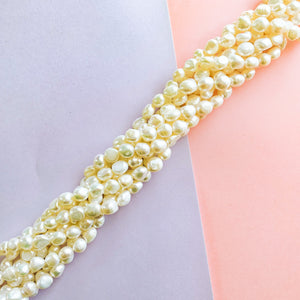 
                
                    Load image into Gallery viewer, 9mm Off-White Potato Pearl Freshwater Pearl Strand
                
            