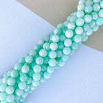 8mm Faceted Aqua Dyed Jade Rounds Strand