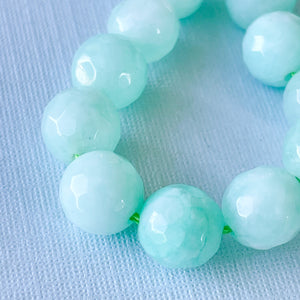 8mm Faceted Aqua Dyed Jade Rounds Strand