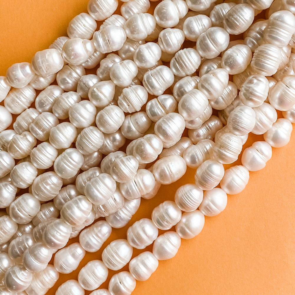 
                
                    Load image into Gallery viewer, 8-10mm Freshwater Large Hole Pearl Strand
                
            