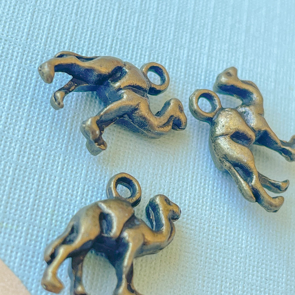 
                
                    Load image into Gallery viewer, 18mm Antique Bronze Camel Charm - 4 Pack
                
            