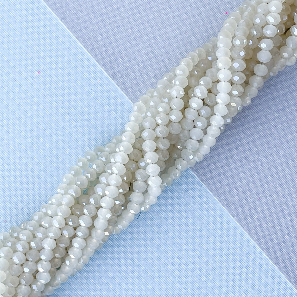 
                
                    Load image into Gallery viewer, 4mm Cloudy Haze Chinese Crystal Rondelle Strand
                
            