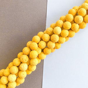 
                
                    Load image into Gallery viewer, 10mm Mustard Yellow Lava Round Strand
                
            