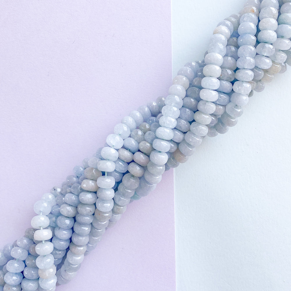 
                
                    Load image into Gallery viewer, 8mm Light Blue Dyed Jade Rondelle Strand
                
            