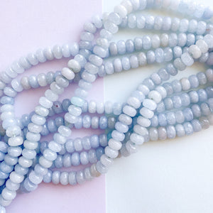 
                
                    Load image into Gallery viewer, 8mm Light Blue Dyed Jade Rondelle Strand
                
            