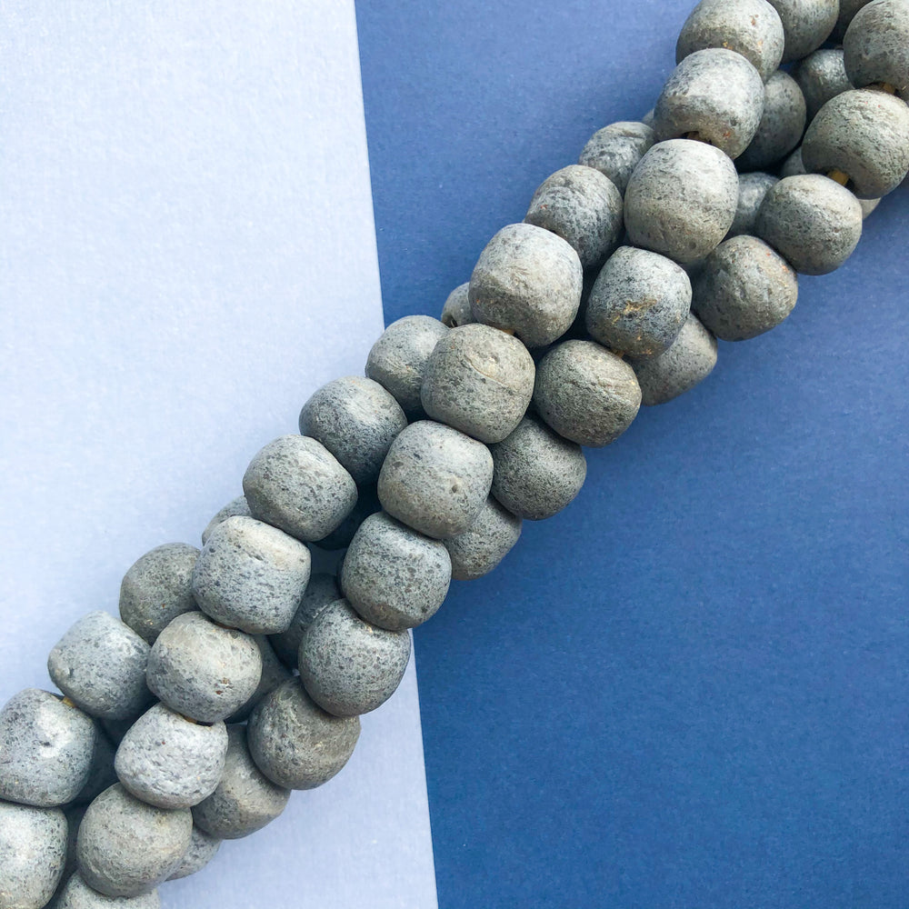 
                
                    Load image into Gallery viewer, 12mm Opaque Steel Blue Recycled African Glass Strand
                
            