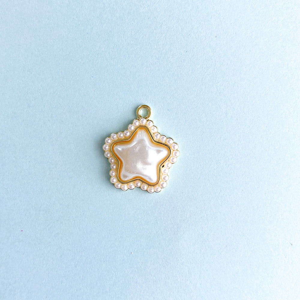 
                
                    Load image into Gallery viewer, 22mm Gold Pearlized Star Charm - 2 Pack
                
            