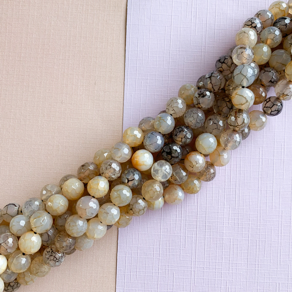 
                
                    Load image into Gallery viewer, 10mm Neutral Crackle Agate Round Strand
                
            