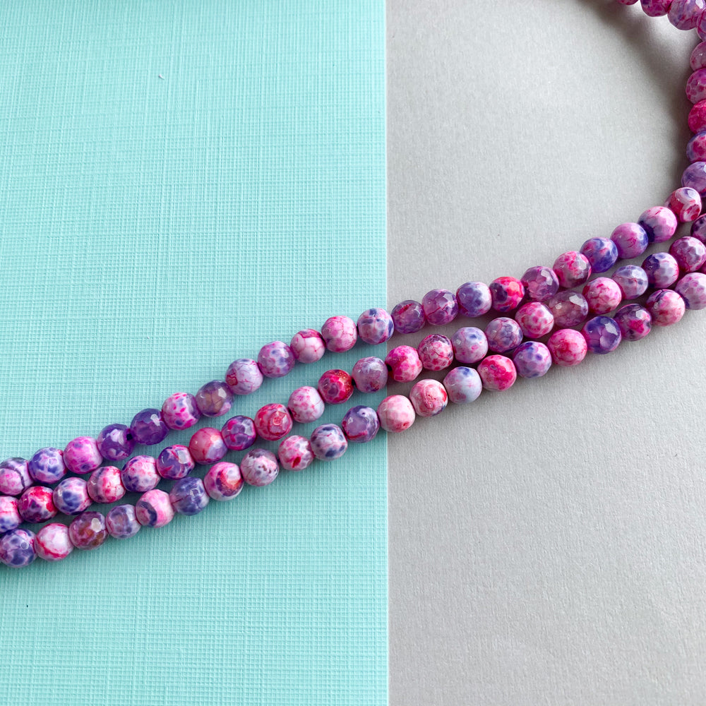 
                
                    Load image into Gallery viewer, 6mm Cotton Candy Agate Faceted Round Strand
                
            