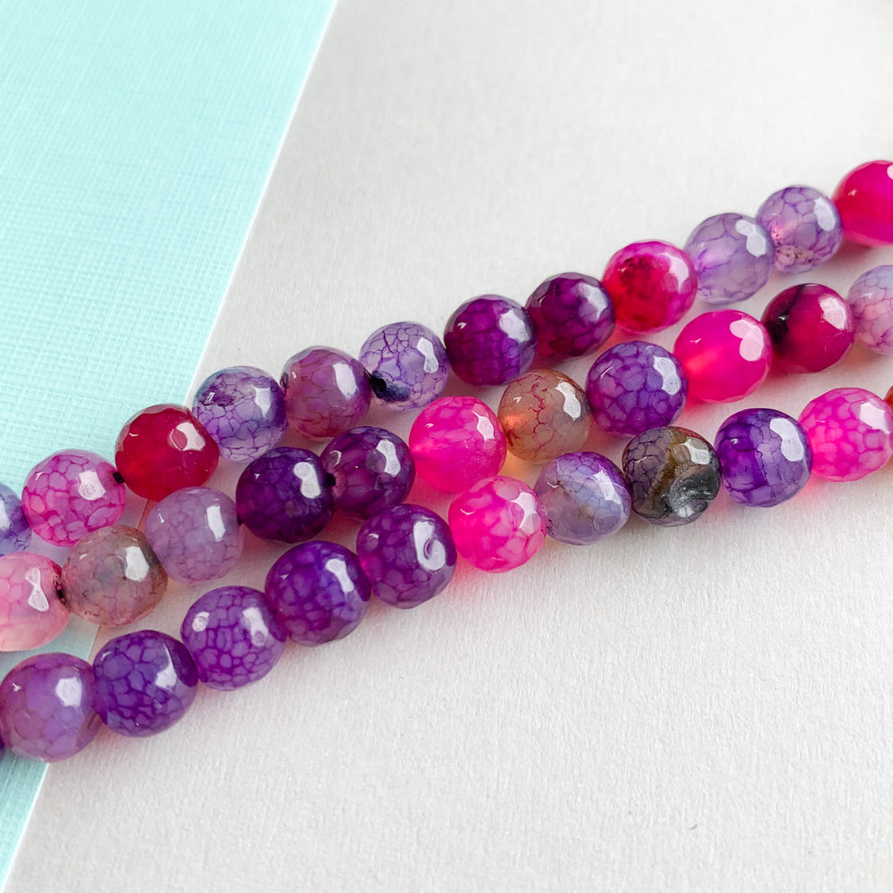 
                
                    Load image into Gallery viewer, 8mm Petunia Agate Faceted Round Strand
                
            
